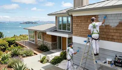 Professional house painters working on exterior home in San Francisco, CA